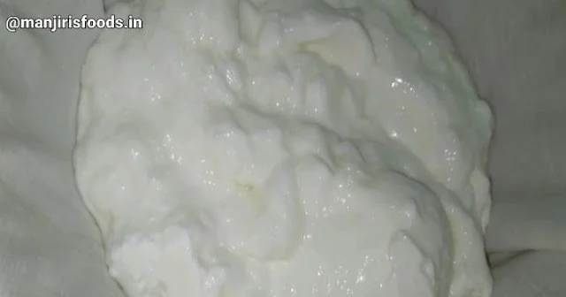 How to Make Shrikhand at Home Homemade curds is kept on a muslin cloth to strain excess water