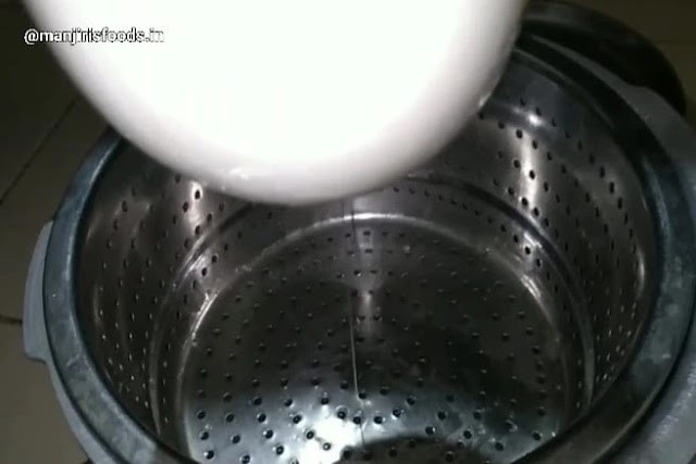 A muslin cloth containg curd is hanged for draining excess water in a strainer