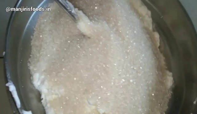 Sugar Added to the hung curd kept in Beating machine